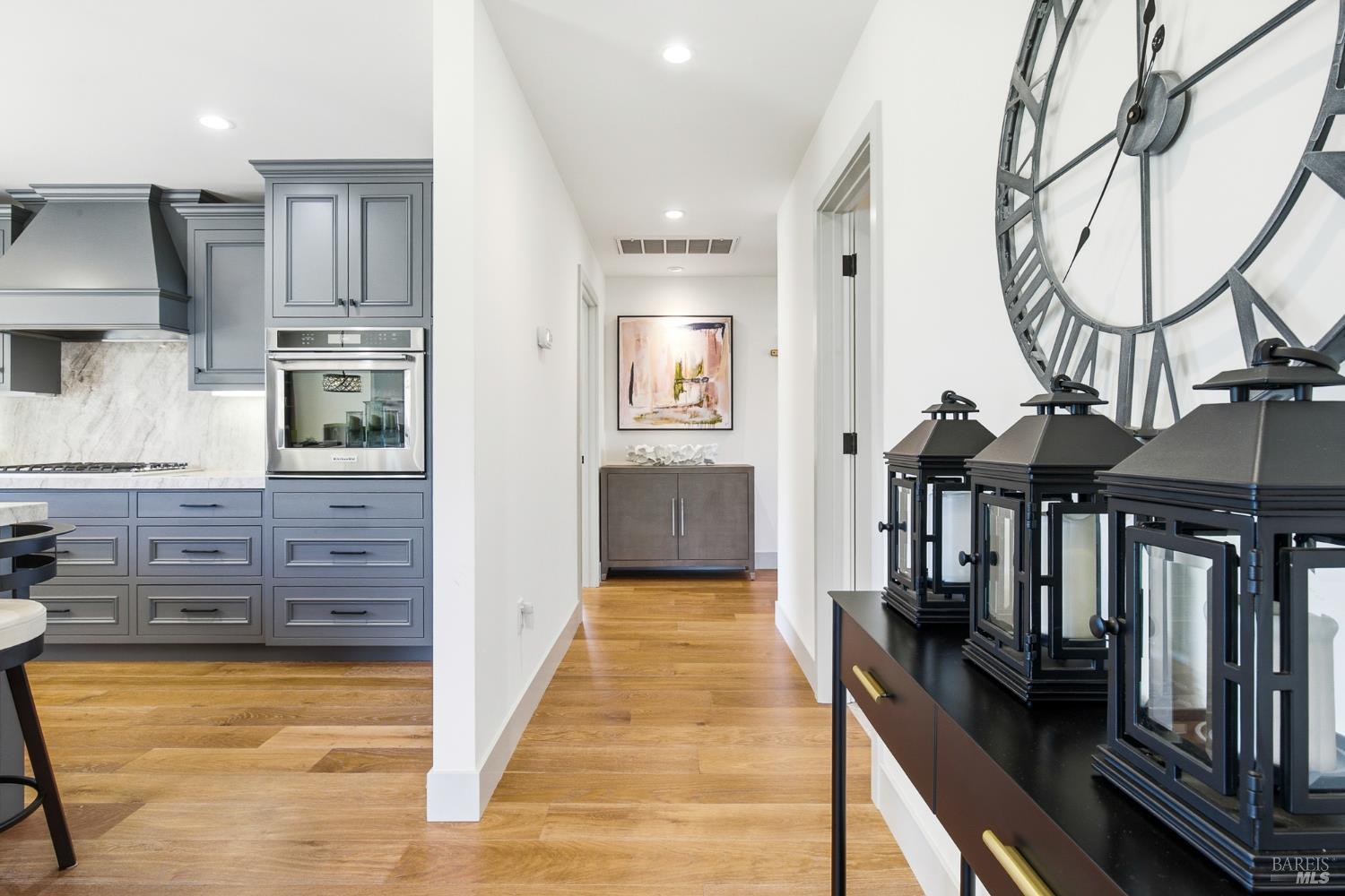 334 Miramonte Way Santa Rosa, CA 95409 - Photo 17 of 46 a view of a kitchen with an entryway and wooden floor