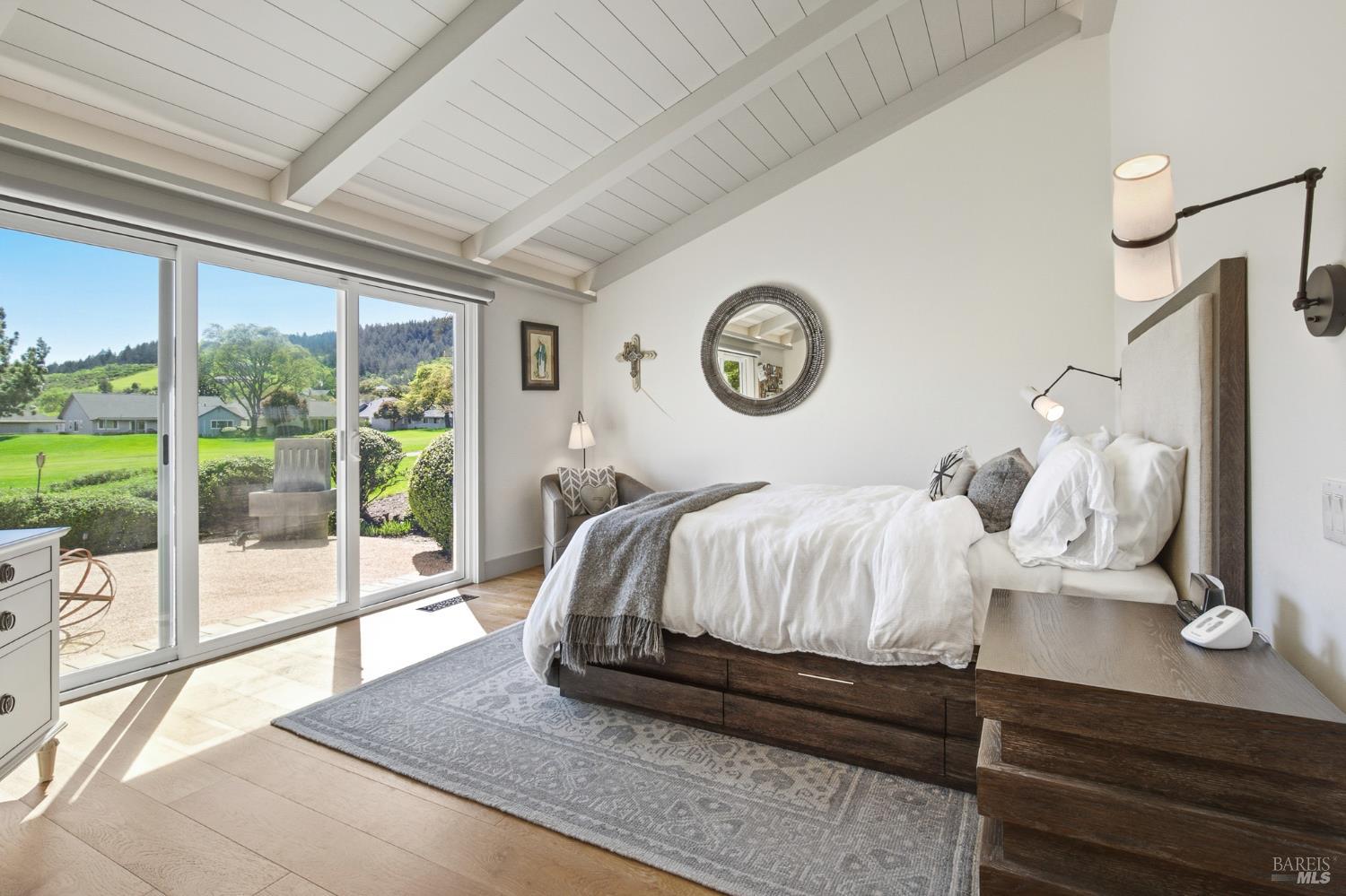 334 Miramonte Way Santa Rosa, CA 95409 - Photo 18 of 46 a bedroom with a bed and a large window with outer view