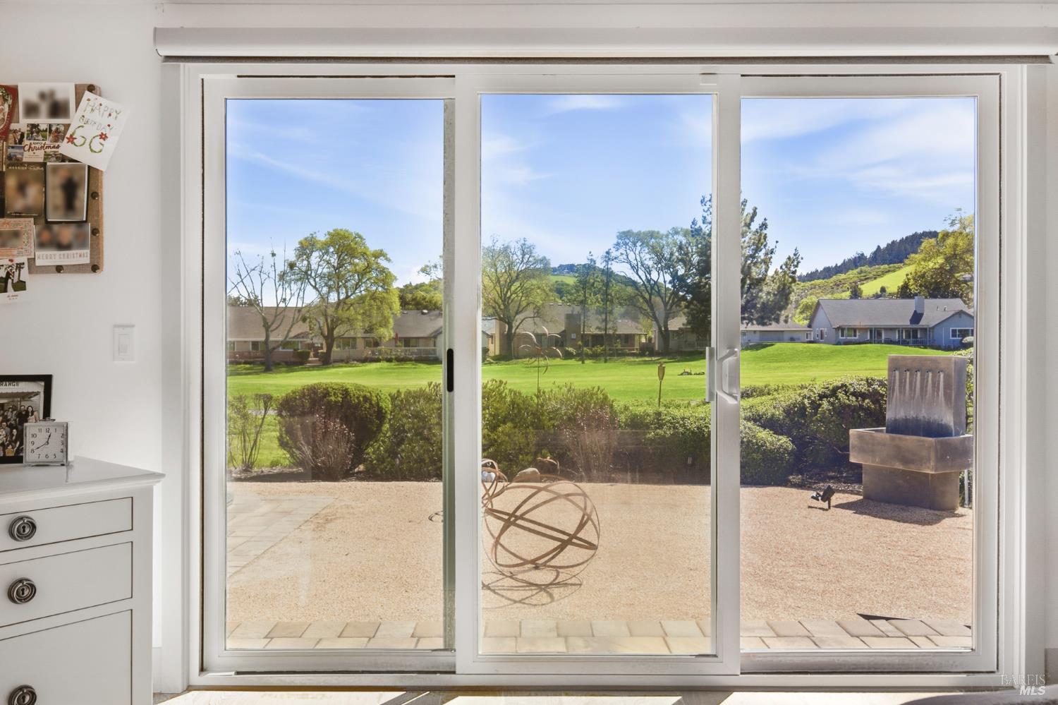 334 Miramonte Way Santa Rosa, CA 95409 - Photo 19 of 46 a view of a room with a large window and dining table