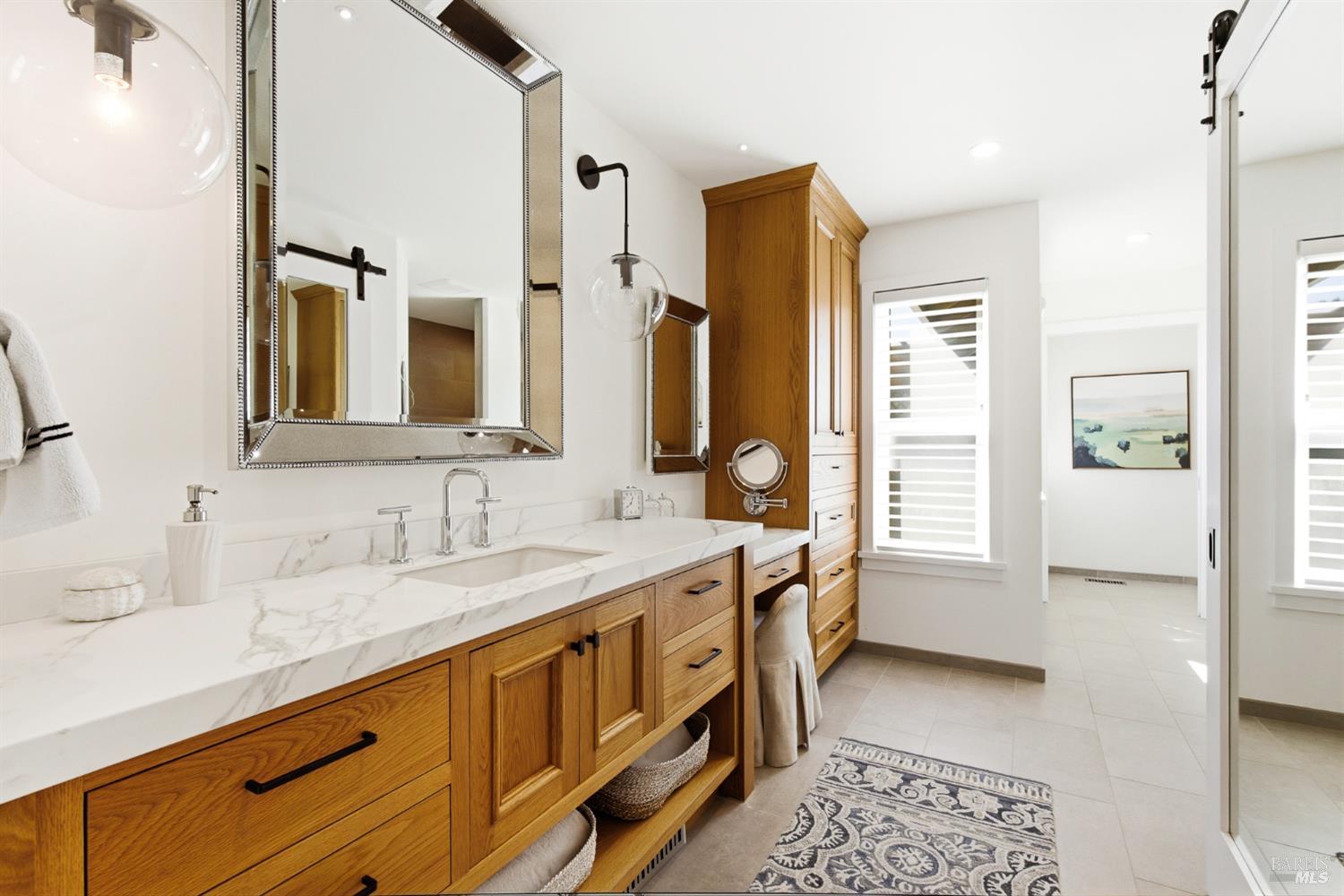 334 Miramonte Way Santa Rosa, CA 95409 - Photo 20 of 46 a spacious bathroom with a double vanity sink and a mirror
