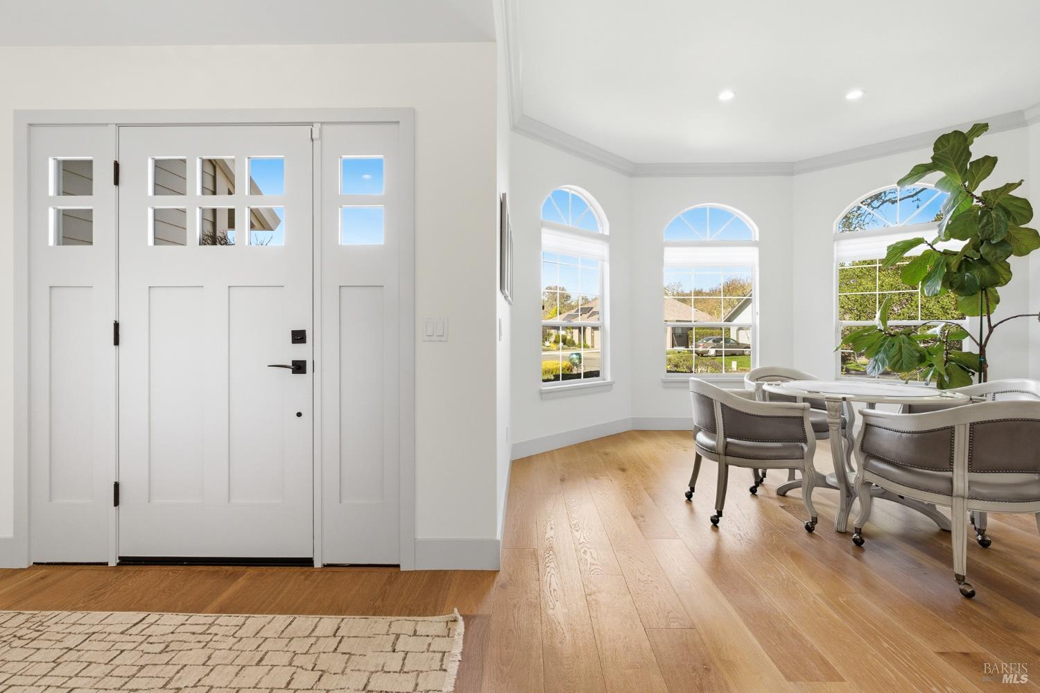 334 Miramonte Way Santa Rosa, CA 95409 - Photo 2 of 46 a workspace with furniture window and wooden floor