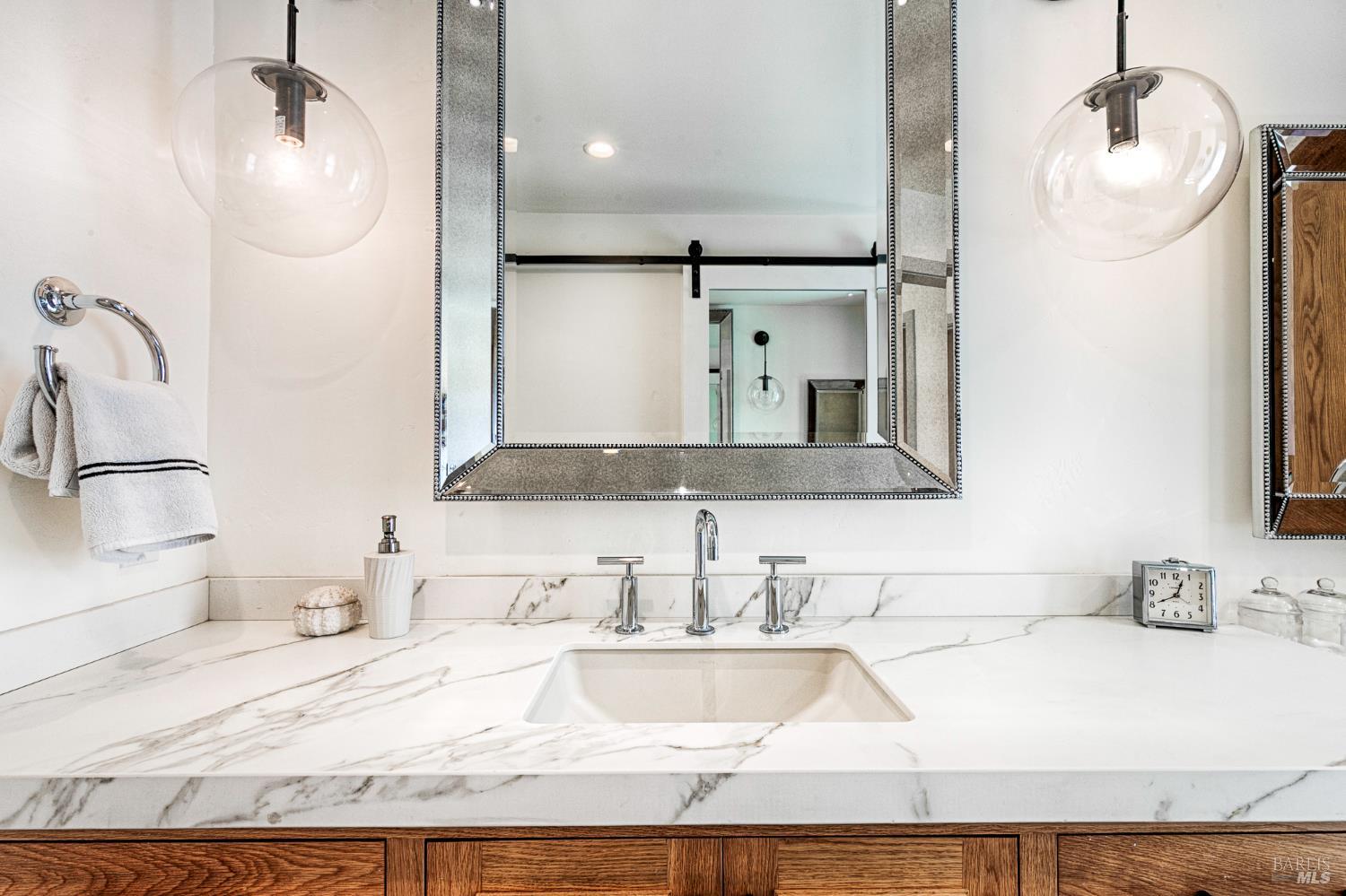 334 Miramonte Way Santa Rosa, CA 95409 - Photo 21 of 46 a bathroom with a granite countertop sink mirror and vanity