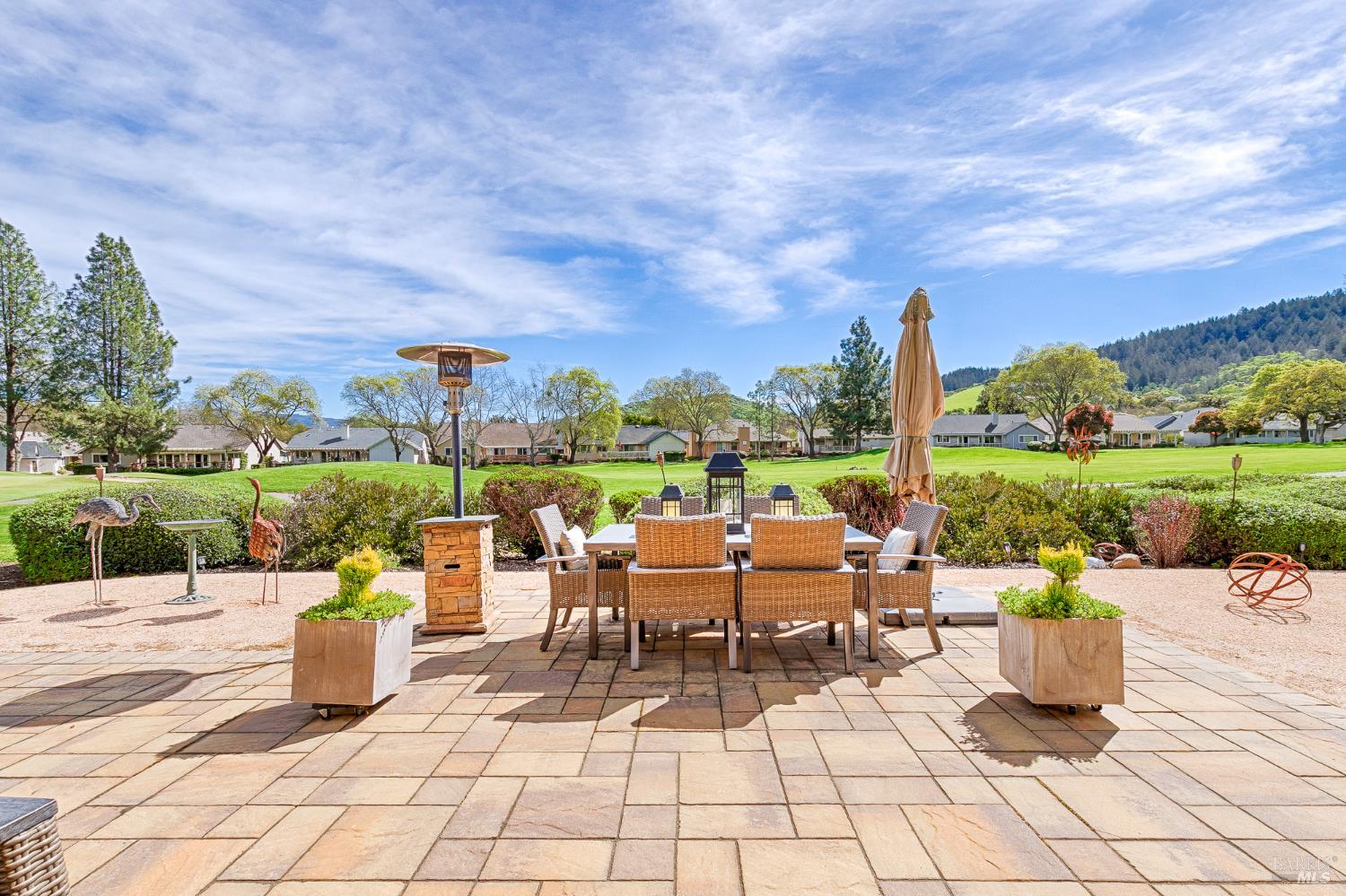 334 Miramonte Way Santa Rosa, CA 95409 - Photo 30 of 46 a view of a patio with a dining table and chairs