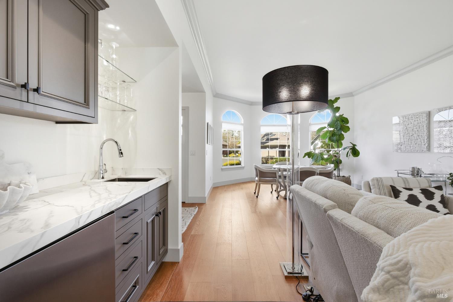 334 Miramonte Way Santa Rosa, CA 95409 - Photo 6 of 46 a living room with furniture a sink and a flat screen tv