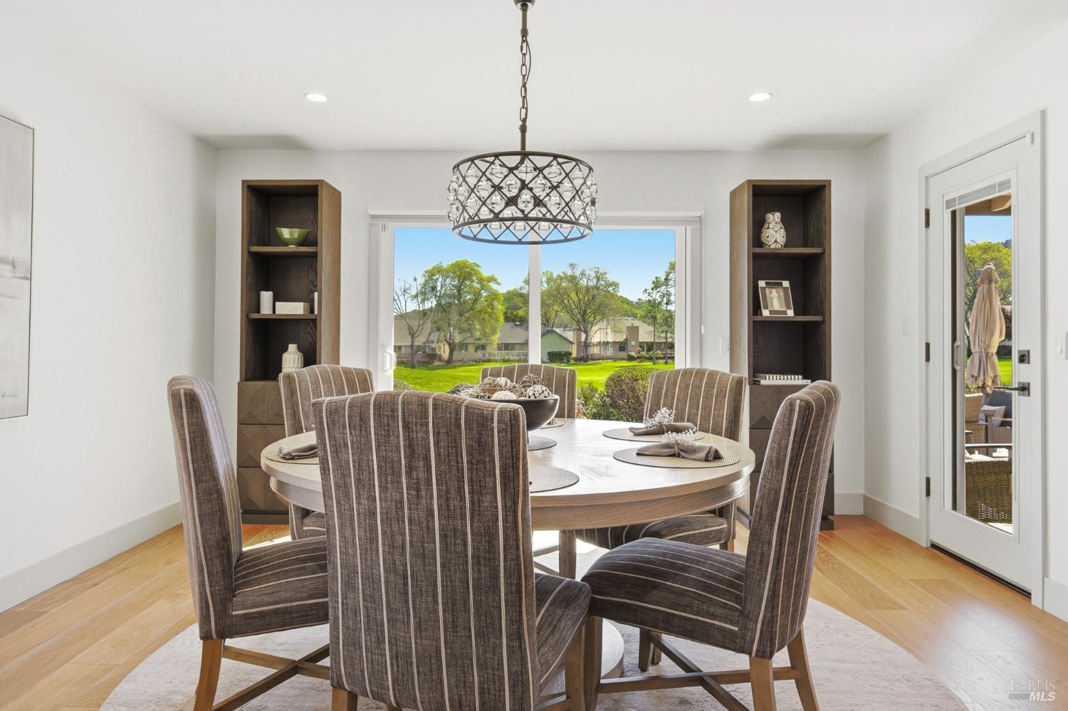 334 Miramonte Way Santa Rosa, CA 95409 - Photo 9 of 46 a view of a dining room with furniture window and wooden floor