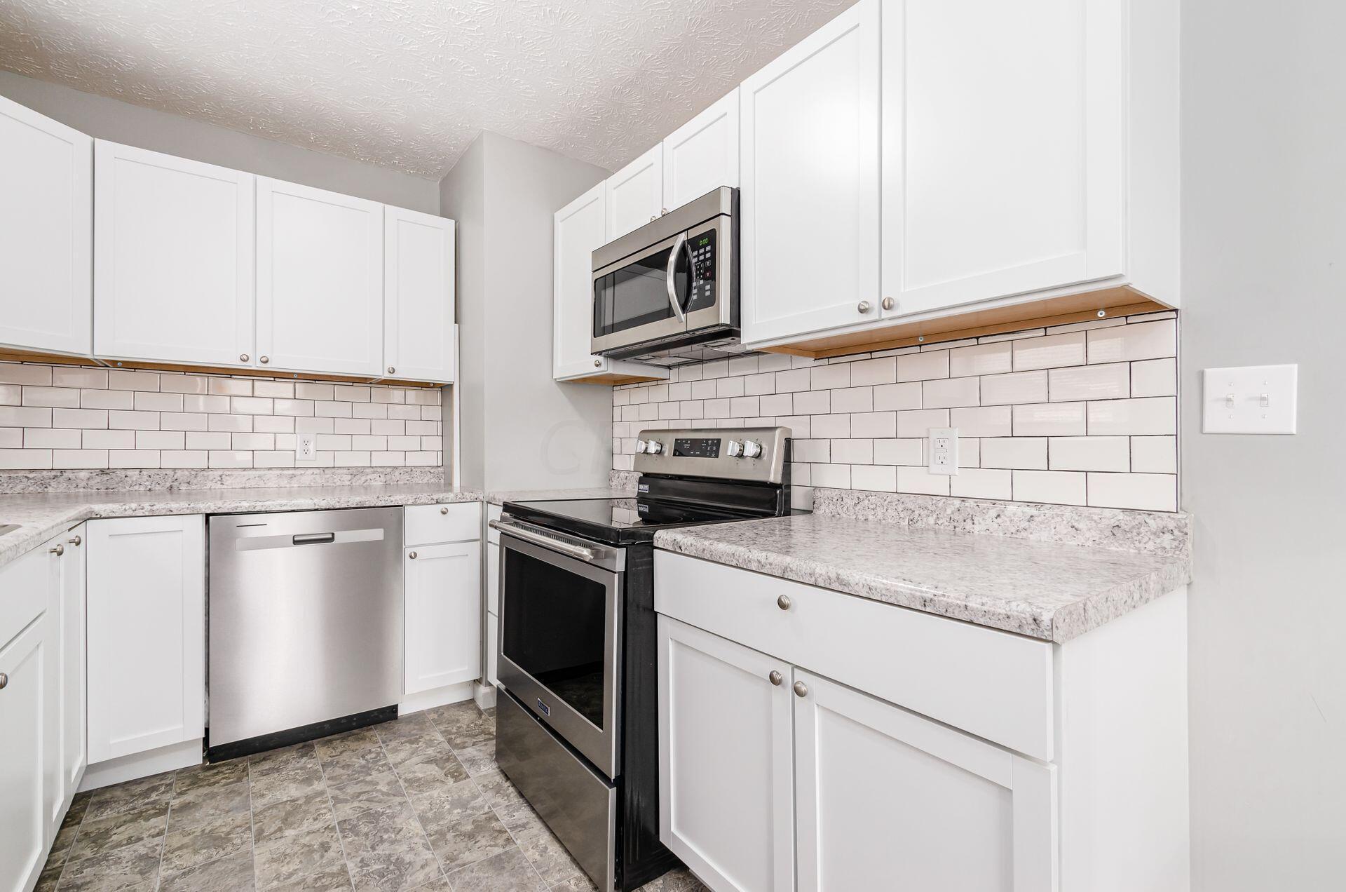 3077 Gerbert Road Columbus, OH 43224 - Photo 10 of 27 Brand New Stainless Steel Appliances.