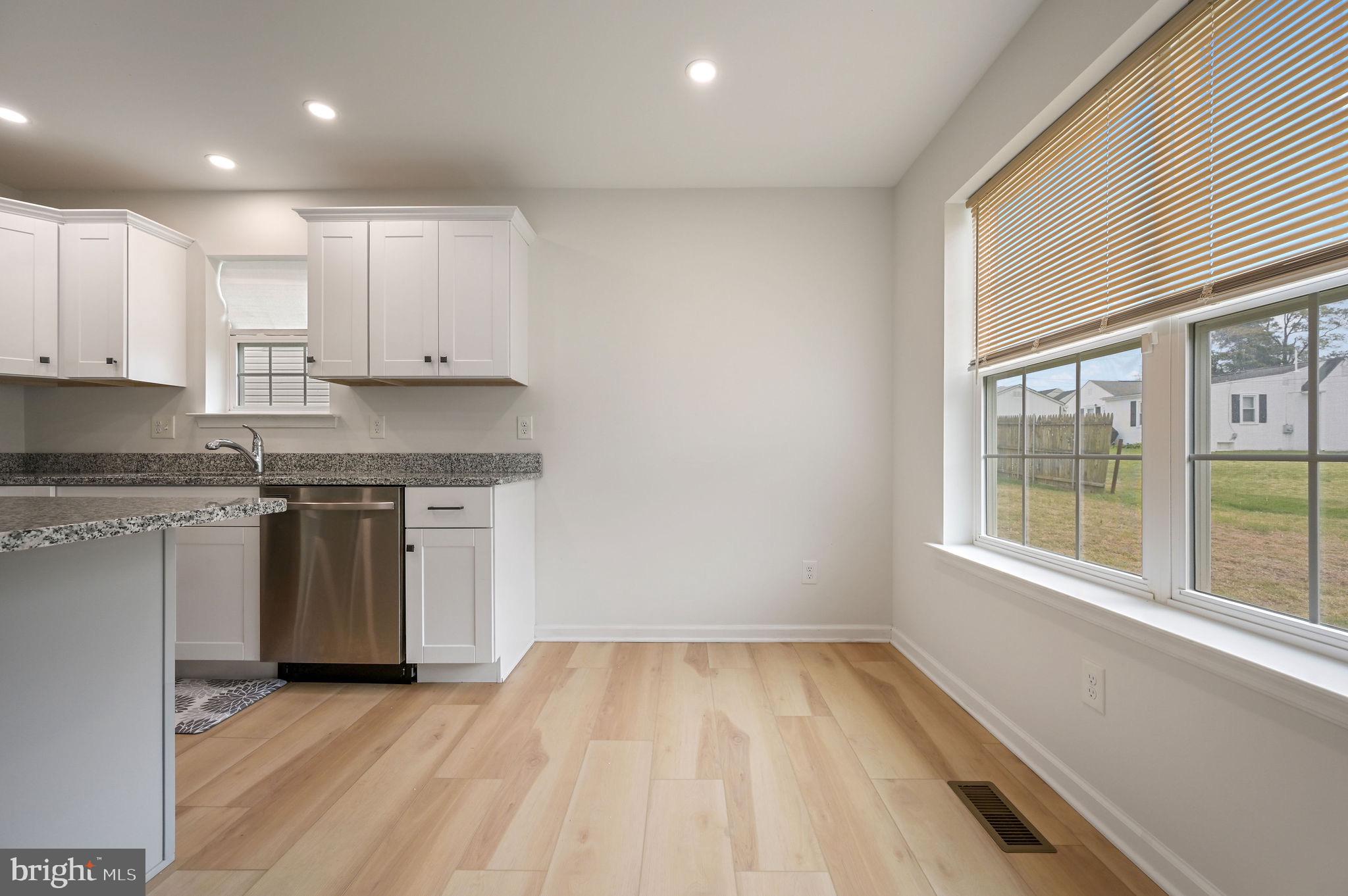 25 Mifflin Avenue New Castle, DE 19720 - Photo 12 of 23 Bright and airy kitchen with modern finishes.