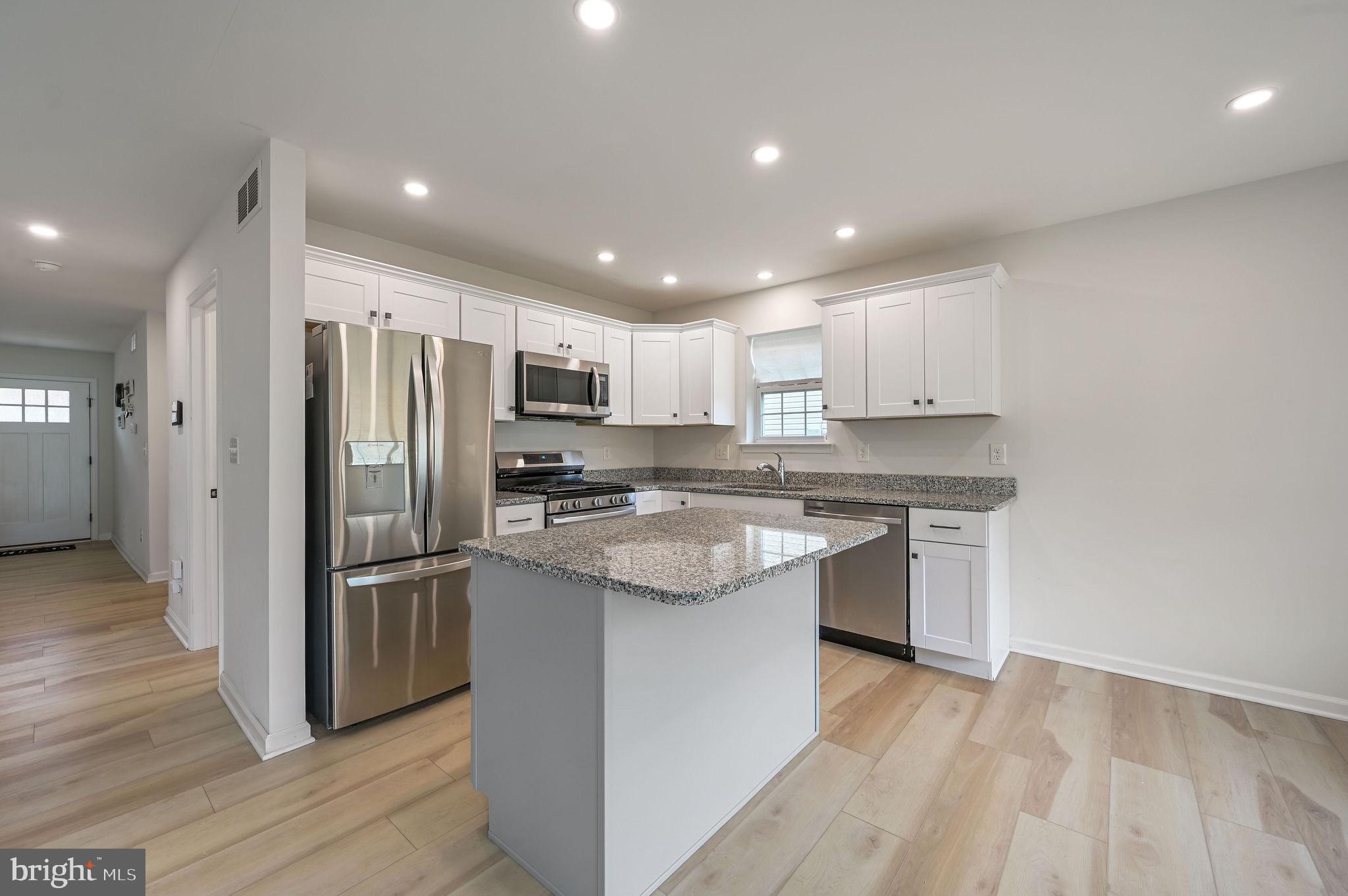 25 Mifflin Avenue New Castle, DE 19720 - Photo 13 of 23 Modern kitchen with sleek finishes.