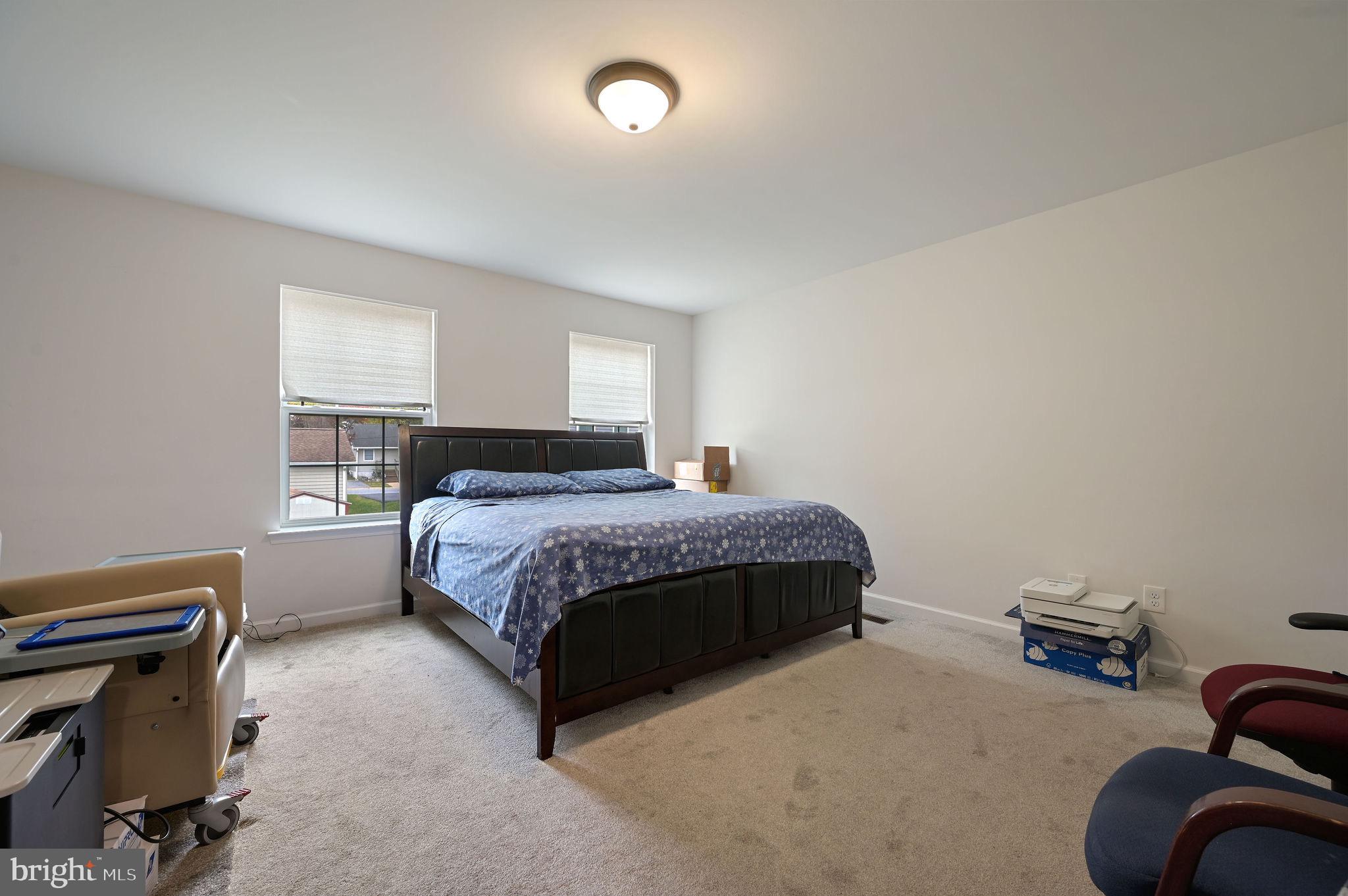 25 Mifflin Avenue New Castle, DE 19720 - Photo 19 of 23 Spacious bedroom with natural light.