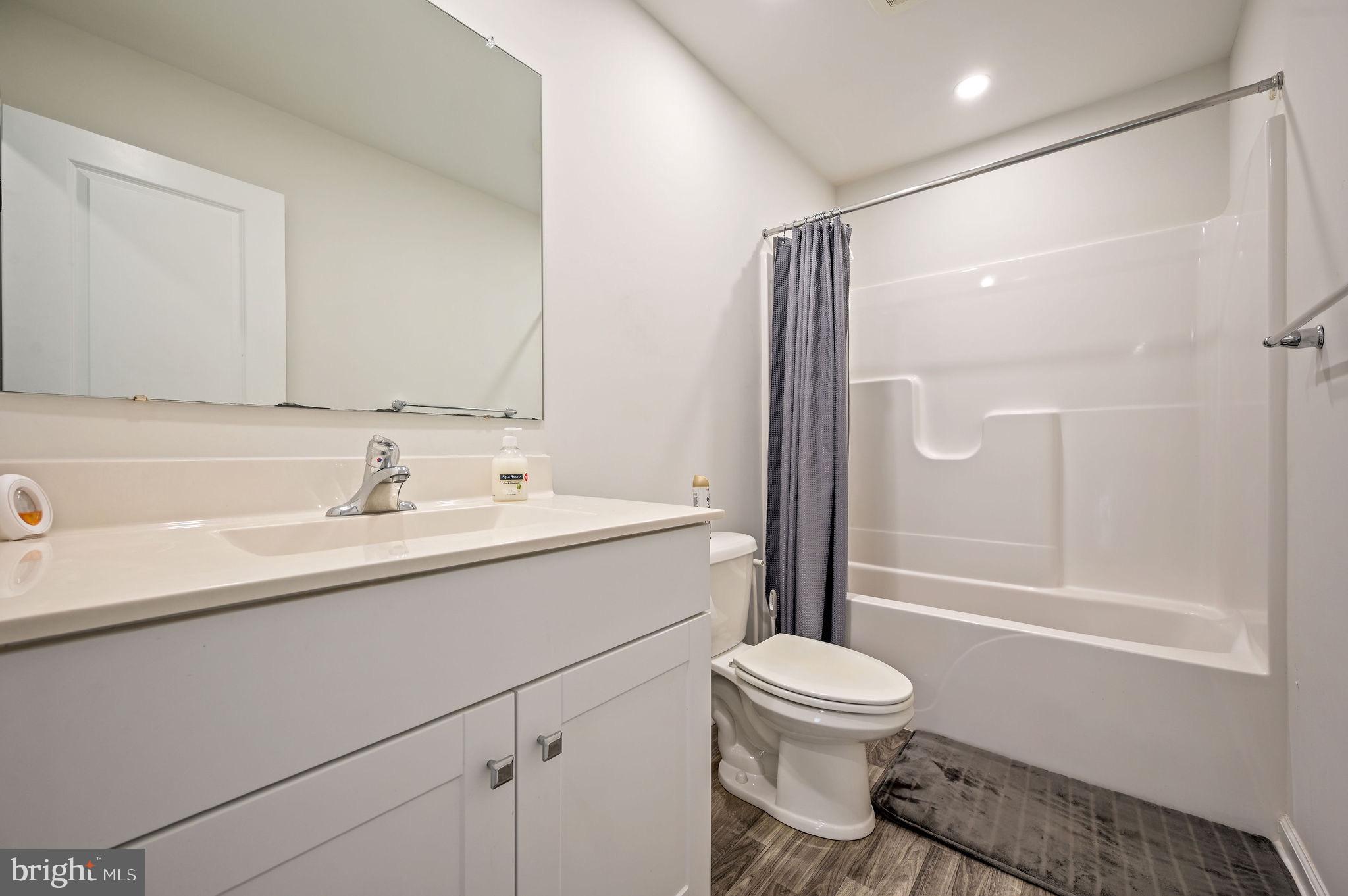 25 Mifflin Avenue New Castle, DE 19720 - Photo 22 of 23 Modern bathroom with sleek finishes.