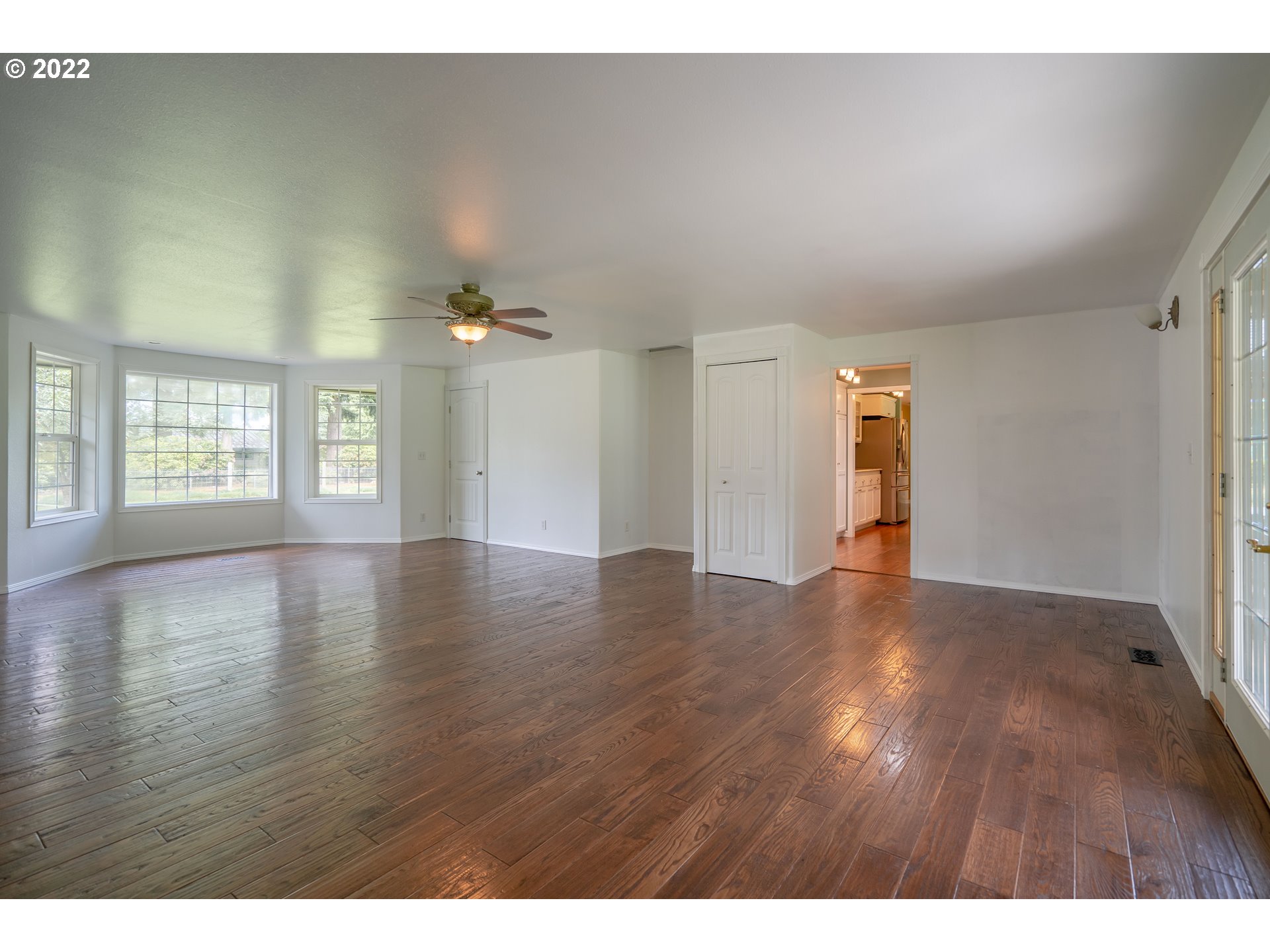 87817 Cedar Flat Road Springfield, OR 97478 - Photo 18 of 32 a view of an empty room with window and wooden floor