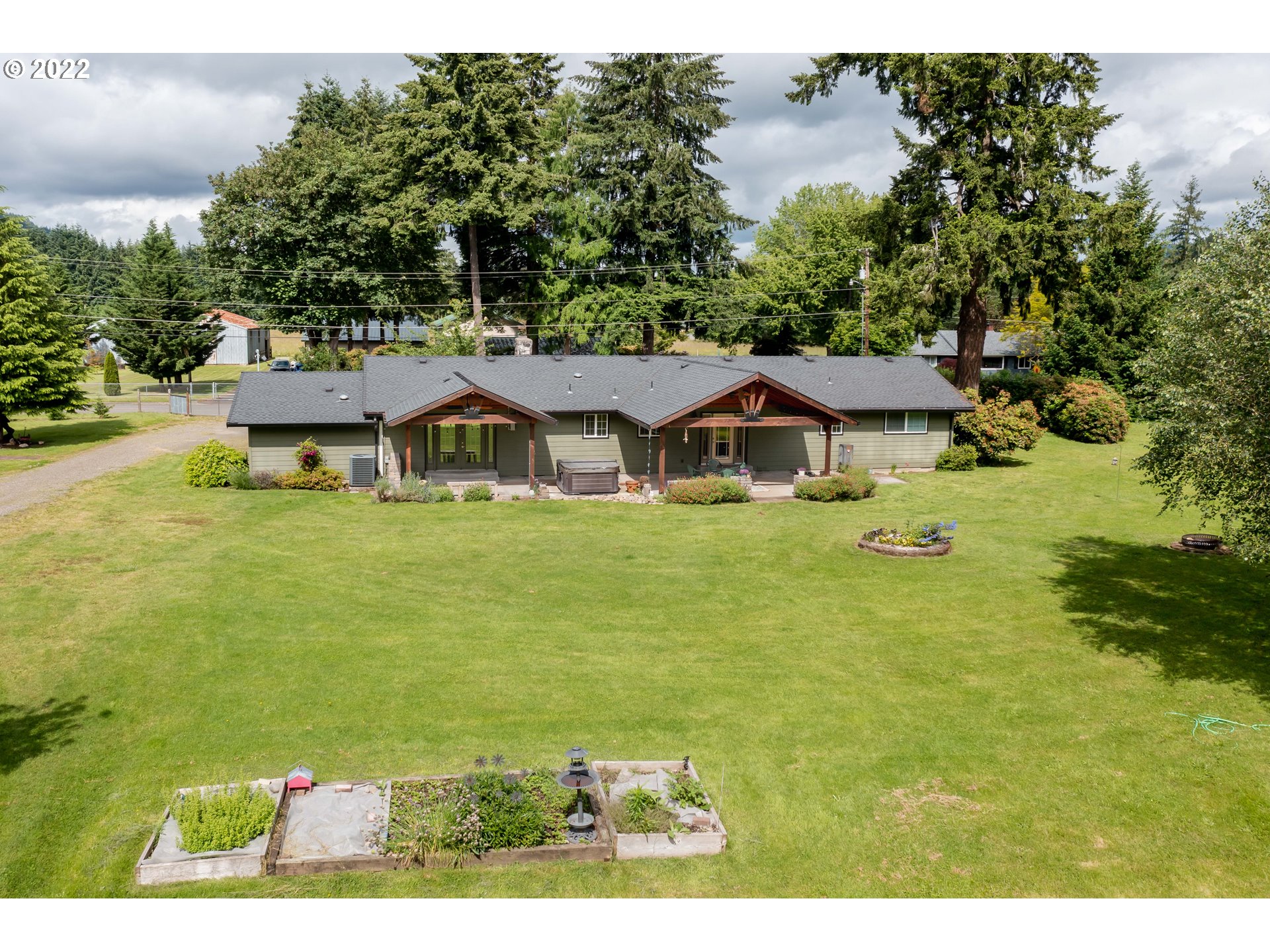 87817 Cedar Flat Road Springfield, OR 97478 - Photo 23 of 32 a aerial view of a house with swimming pool garden and patio