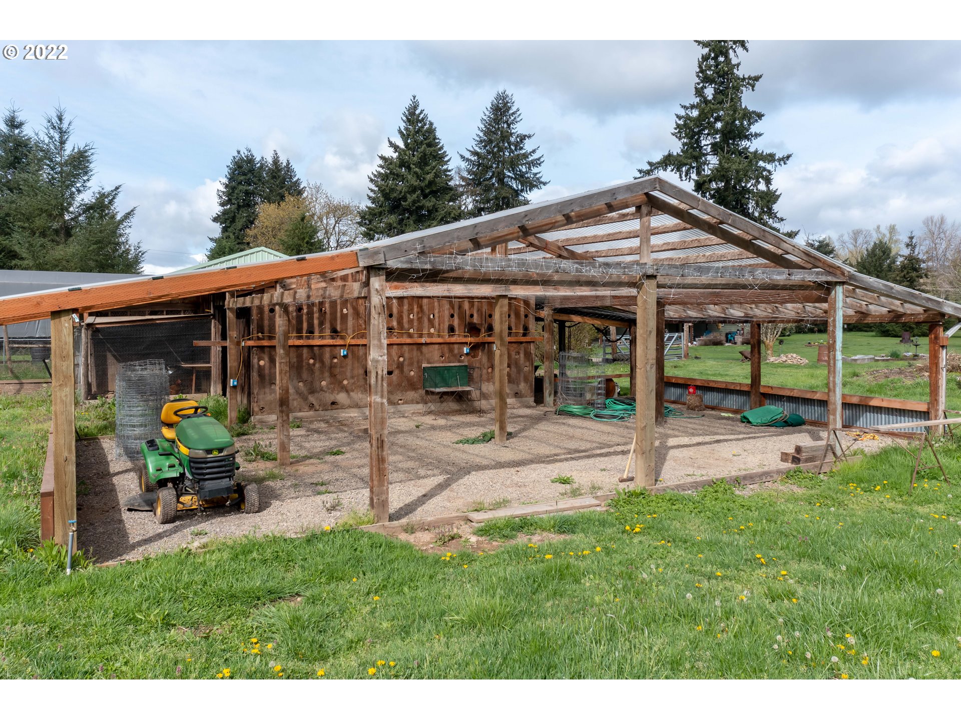 87817 Cedar Flat Road Springfield, OR 97478 - Photo 26 of 32 a view of an house with backyard porch and sitting area