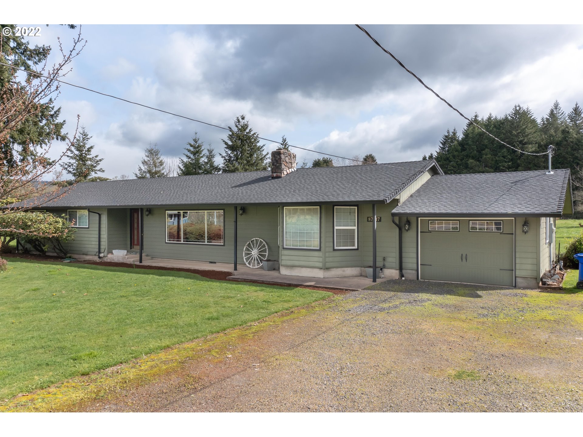 87817 Cedar Flat Road Springfield, OR 97478 - Photo 3 of 32 a house view with a garden space