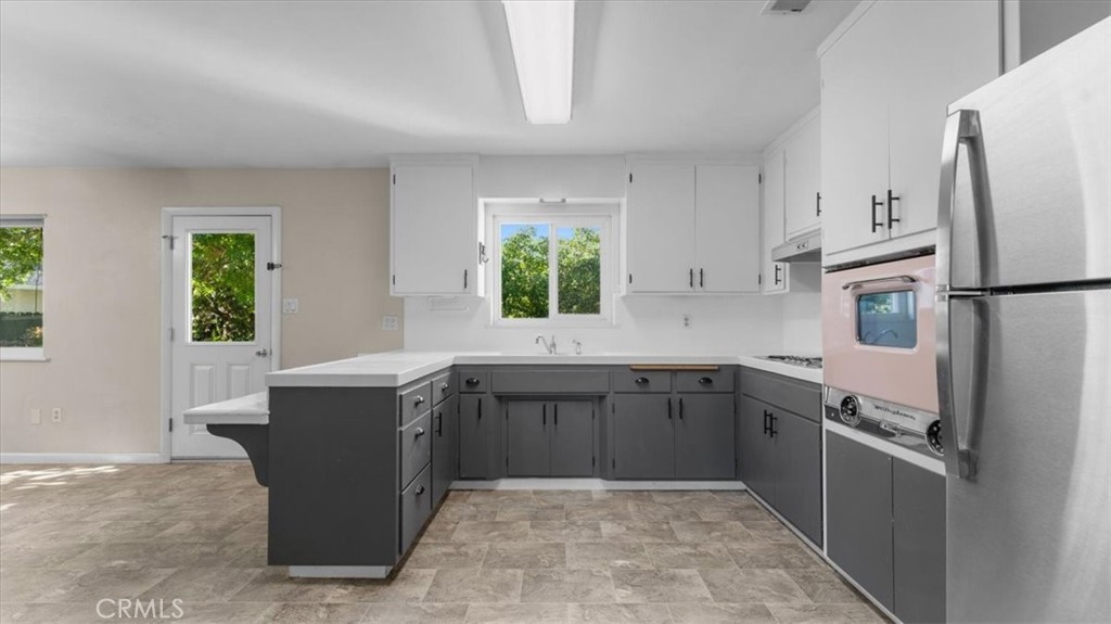 3658 Rodgers Avenue Chico, CA 95928 - Photo 11 of 52 a kitchen with a refrigerator sink and stove