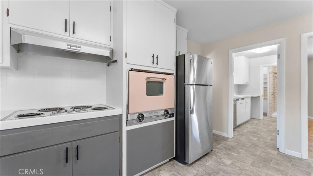 3658 Rodgers Avenue Chico, CA 95928 - Photo 14 of 52 a kitchen with stainless steel appliances granite countertop a refrigerator and a stove