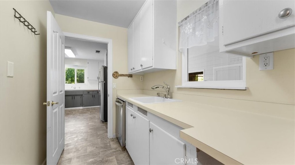 3658 Rodgers Avenue Chico, CA 95928 - Photo 20 of 52 a kitchen with a sink cabinets and appliances
