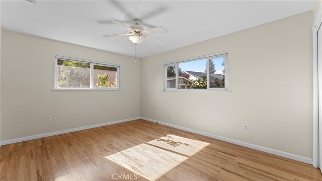 3658 Rodgers Avenue Chico, CA 95928 - Photo 26 of 52 a view of an empty room with a window and wooden floor