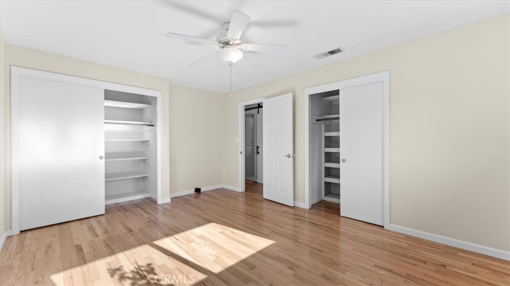 3658 Rodgers Avenue Chico, CA 95928 - Photo 27 of 52 a view of a bedroom with wooden floor