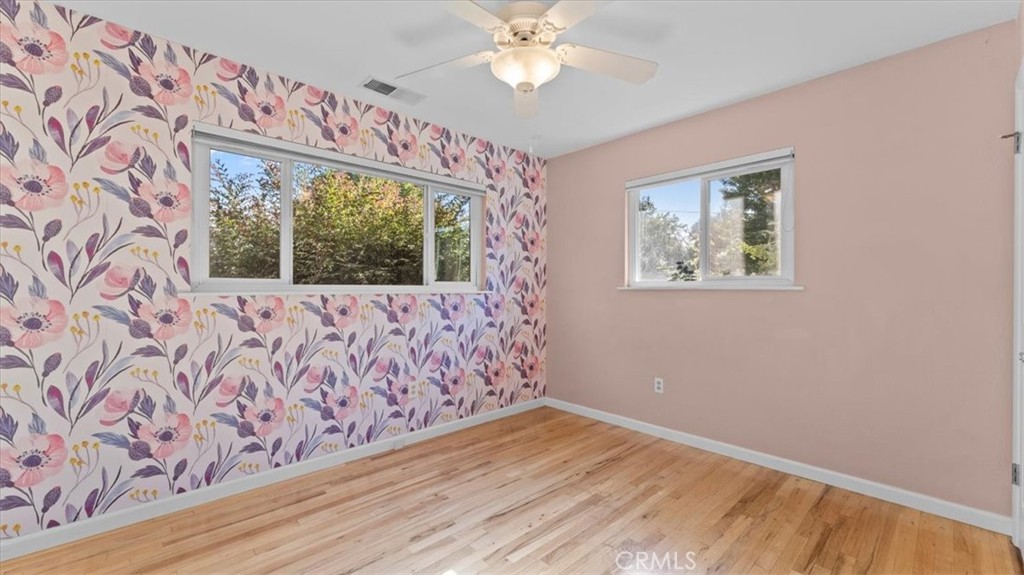 3658 Rodgers Avenue Chico, CA 95928 - Photo 28 of 52 a view of an empty room with wooden floor and a window