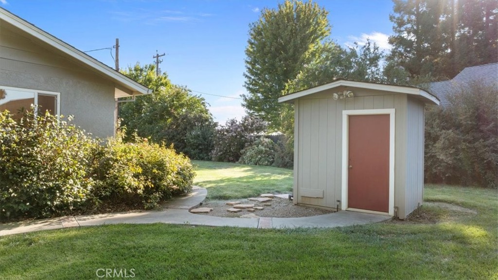 3658 Rodgers Avenue Chico, CA 95928 - Photo 37 of 52 a view of a wooden house with a yard