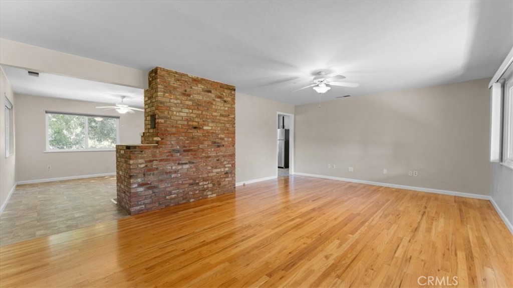 3658 Rodgers Avenue Chico, CA 95928 - Photo 5 of 52 a view of empty room with wooden floor and fan