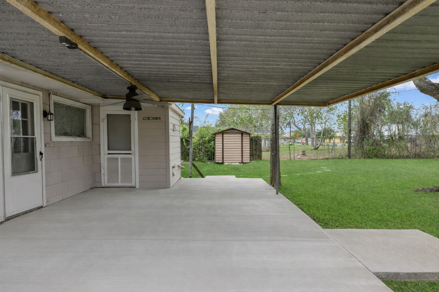 1921 Foote Street Wharton, TX 77488 - Photo 15 of 18 a view of a porch with garden