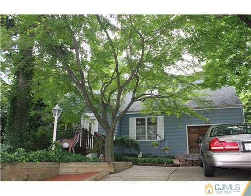 24 Old Post Road Edison, NJ 08817 - Photo 1 of 22 a view of a house with a backyard