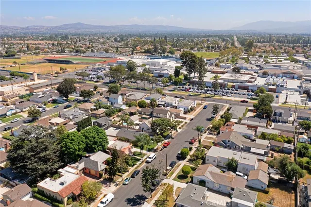 an aerial view of a city with lots of residential buildings