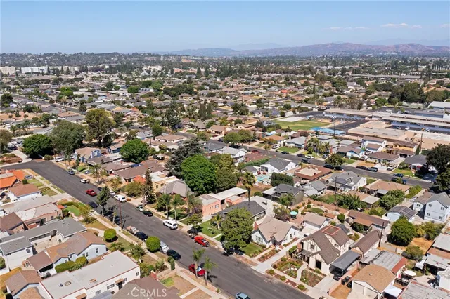 an aerial view of a city with lots of residential buildings