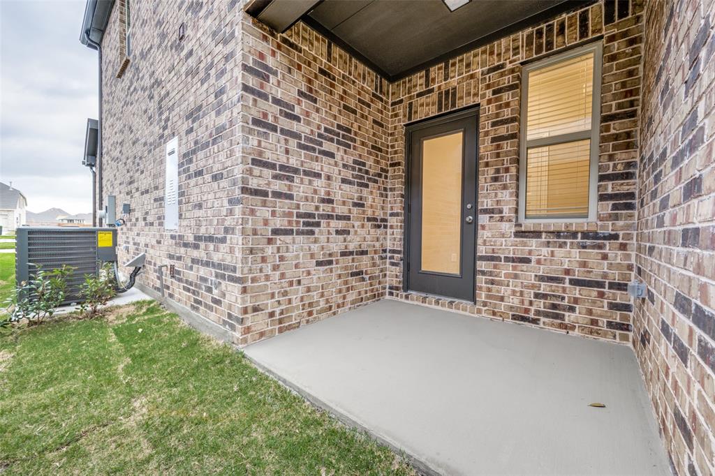 1237 Milfoil Drive Justin, TX 76247 - Photo 23 of 27 Patio off the kitchen ideal for relaxation