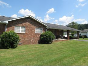 4242 Halifax Road Coeburn, VA 24230 - Photo 1 of 11 Front view from side