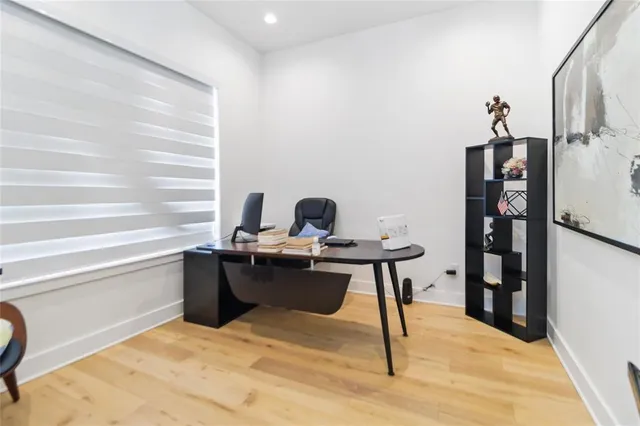 a view of a workspace with furniture
