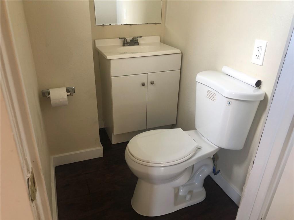 1141 9th Street McKees Rocks, PA 15136 - Photo 5 of 21 a bathroom with a toilet and a sink