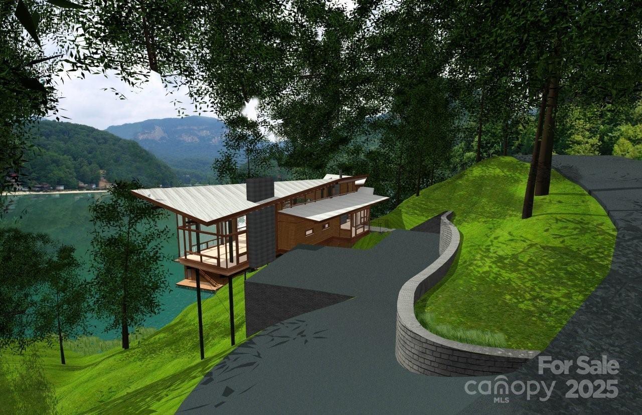 0 Chapel Point Road, Unit 14 Lake Lure, NC 28746 - Photo 1 of 12 an aerial view of a house having yard