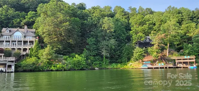 a view of a lake with a big yard