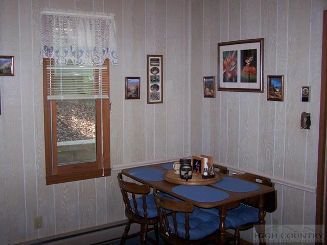 355 Trout Lake Road Deep Gap, NC 28618 - Photo 7 of 45 a view of a workspace with furniture