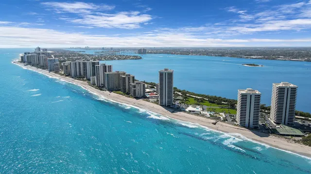 a view of a city with an ocean view