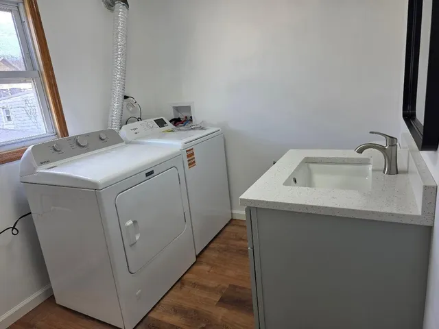 a utility room with dryer and washer