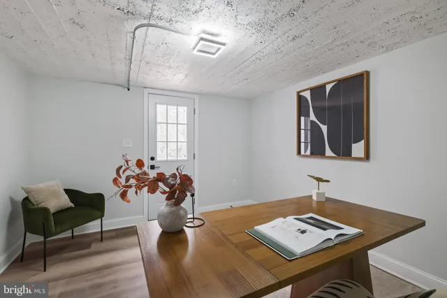 a workspace with furniture and window