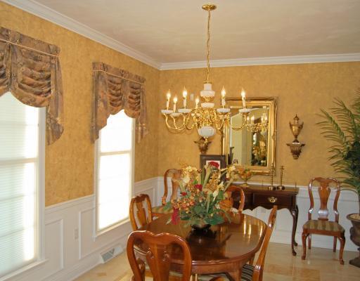 16 Renaissance Drive Irwin, PA 15642 - Photo 2 of 18 Dining Room. Very Elegant with crown moulding and wainscoating