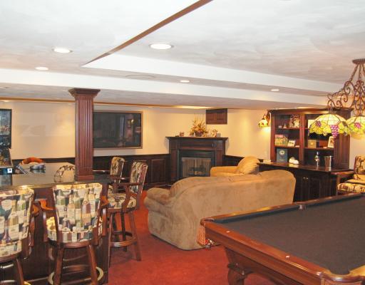 16 Renaissance Drive Irwin, PA 15642 - Photo 12 of 18 Den/Family/Great Room. large game room with wet bar, fireplace and built-in cabinetry