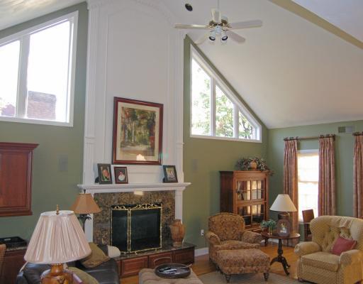 16 Renaissance Drive Irwin, PA 15642 - Photo 10 of 18 Den/Family/Great Room. 1st floor family room wth fireplace, cathedral ceiling, built-in cabinetry and access to the rear patio