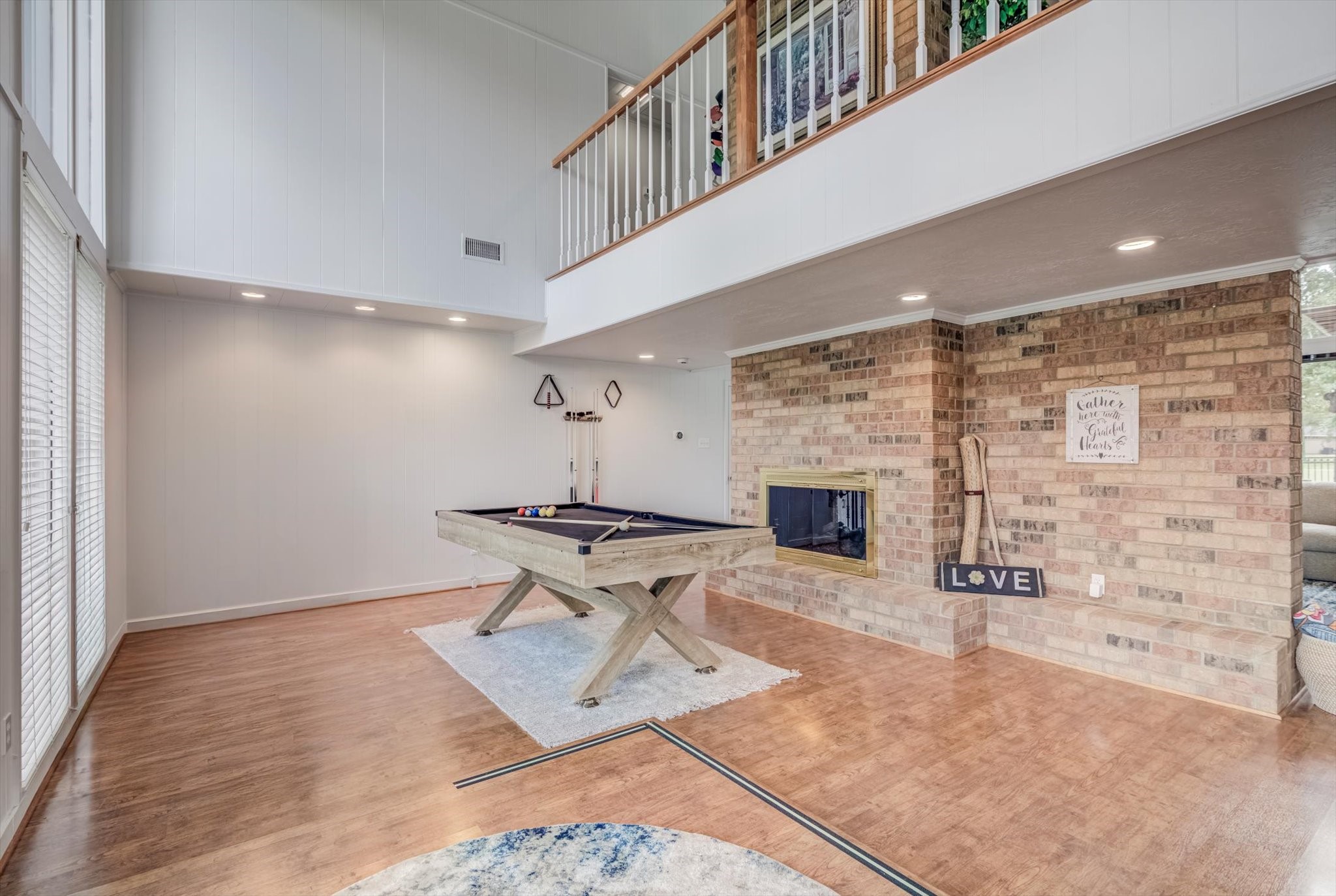 22 Winged Foot Drive Conroe, TX 77304 - Photo 13 of 49 a living room with furniture and a fireplace