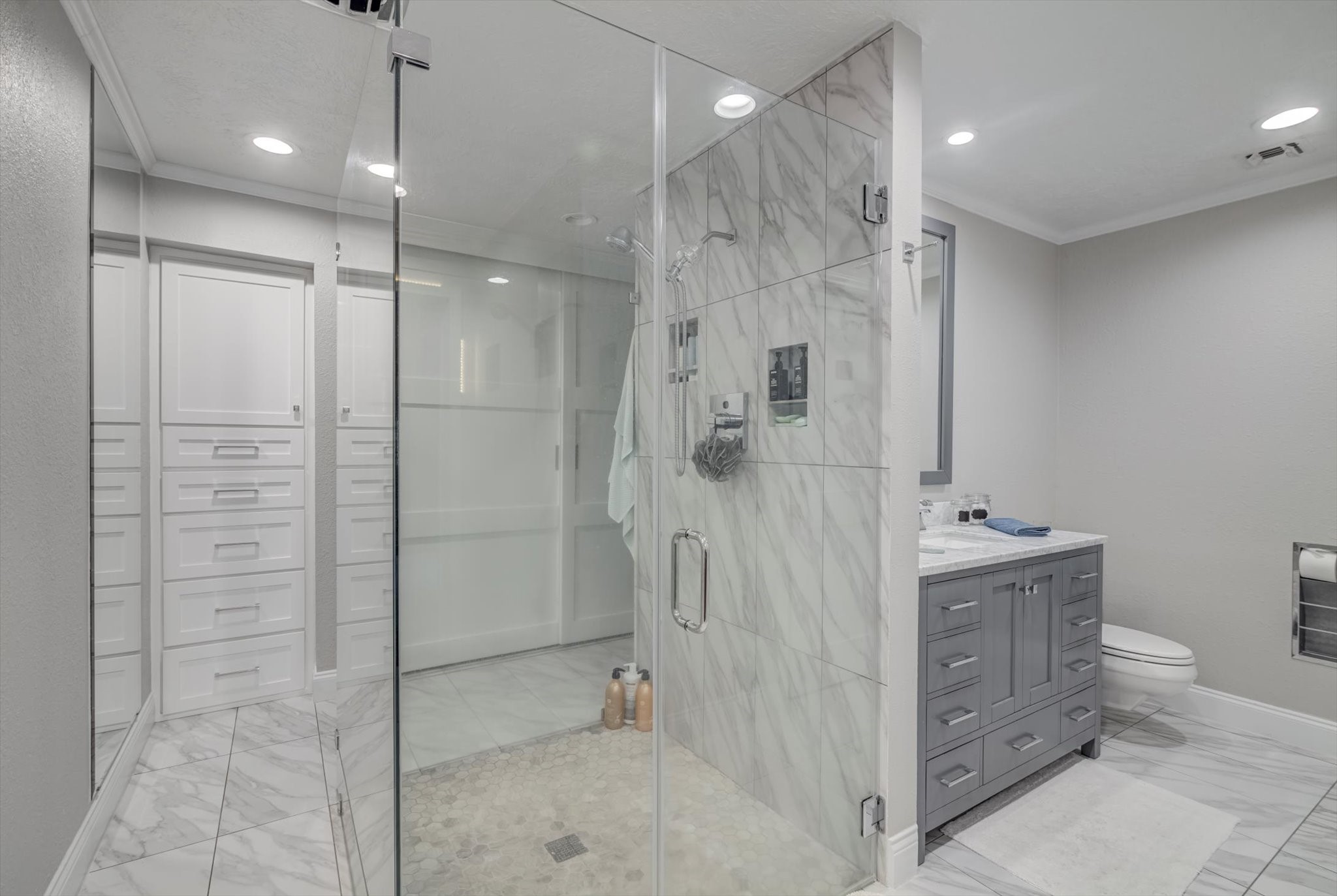 22 Winged Foot Drive Conroe, TX 77304 - Photo 26 of 49 a bathroom with a shower and a toilet