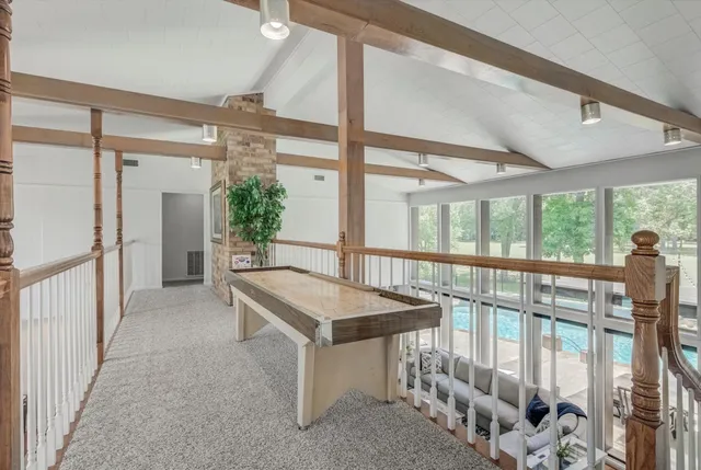 a bedroom with a bed and cabinets