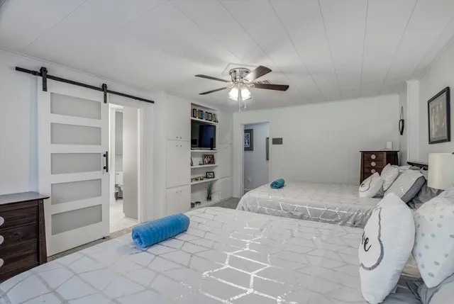 a bathroom with a bathtub and a sink