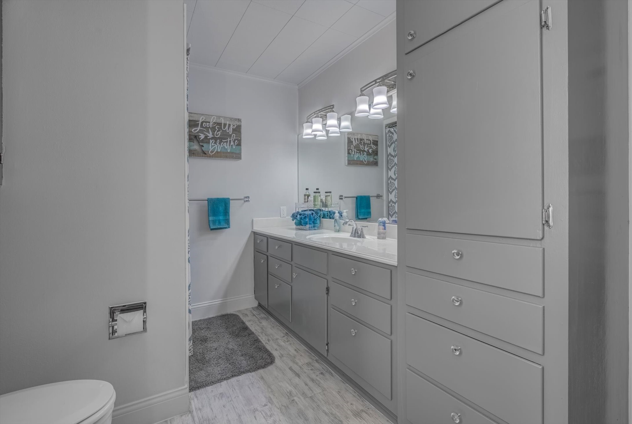 22 Winged Foot Drive Conroe, TX 77304 - Photo 33 of 49 a bathroom with a sink toilet and shower