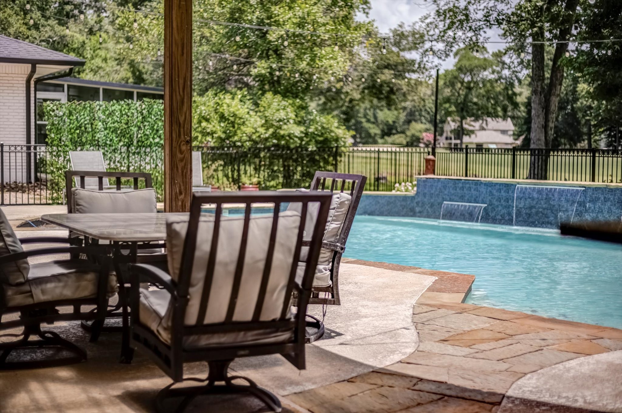 22 Winged Foot Drive Conroe, TX 77304 - Photo 46 of 49 a view of a backyard with a deck