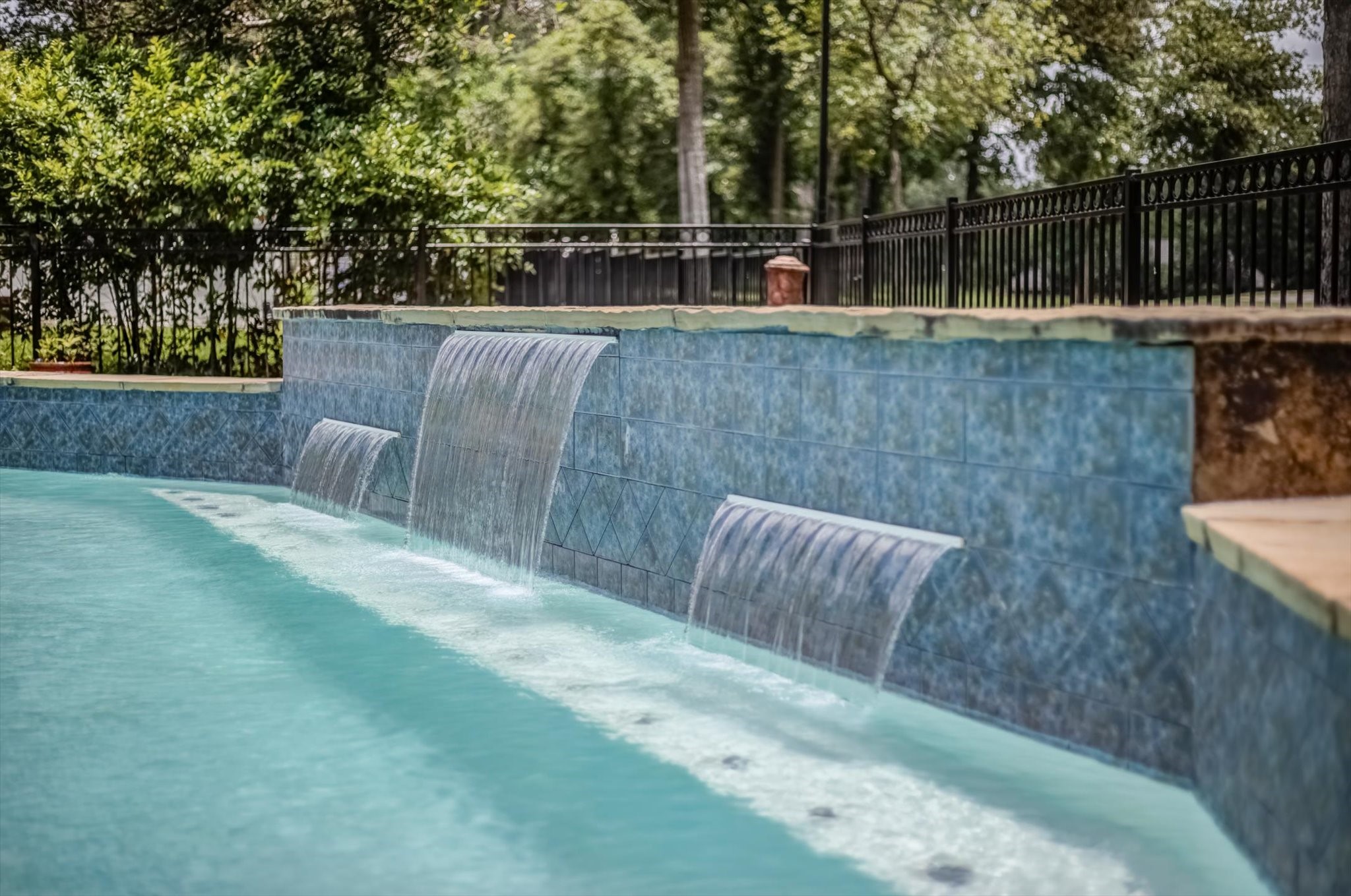22 Winged Foot Drive Conroe, TX 77304 - Photo 47 of 49 a view of a backyard with wooden fence